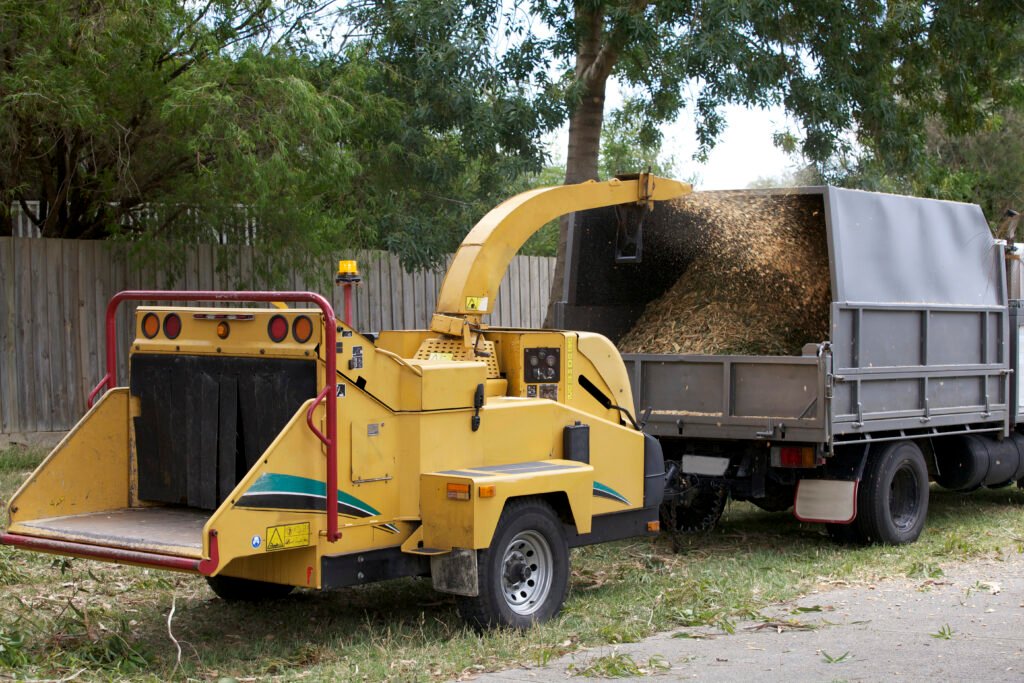 Wood chipper sprays debris